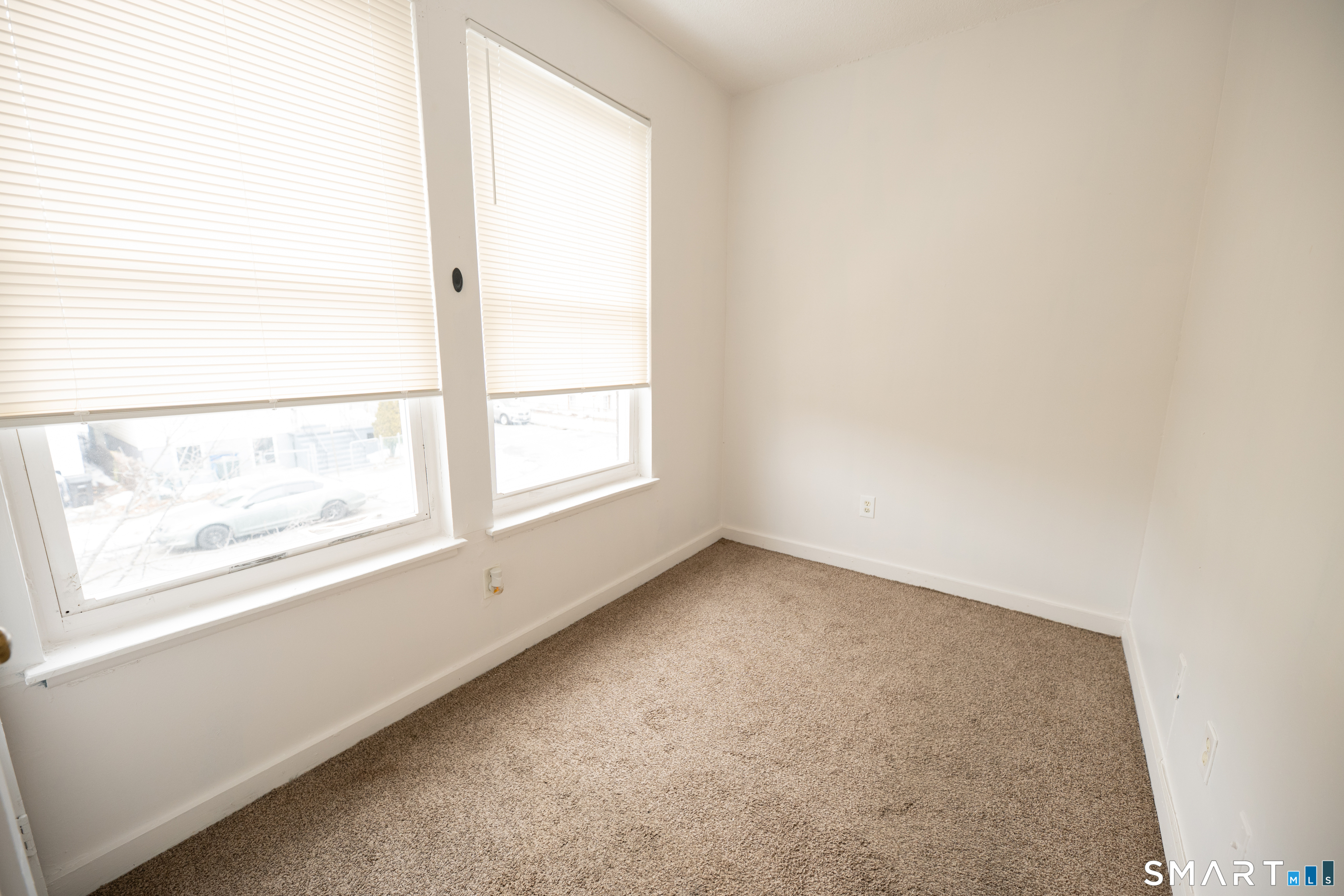 86 Spring Street, Unit 2 West Haven, CT 06516 - Photo 24 of 27 an empty room with a window