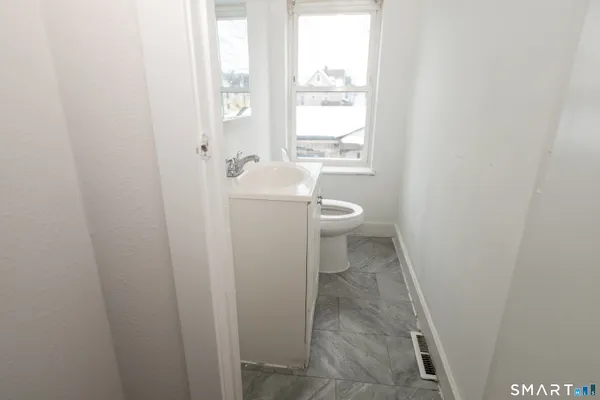 a bathroom with a toilet