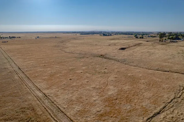 a view of ocean with boats