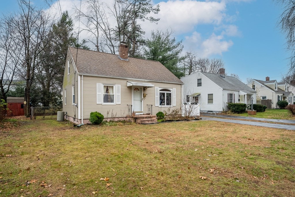 107 Mayflower Road Springfield, MA 01118 - Photo 2 of 32 a view of a house with backyard and sitting area