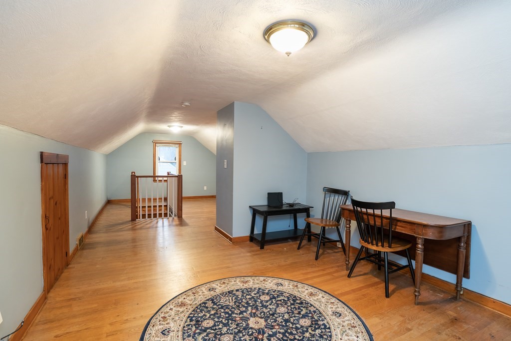 107 Mayflower Road Springfield, MA 01118 - Photo 24 of 32 a dining room with furniture and a rug