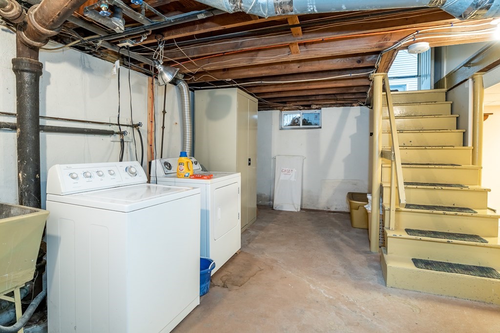 107 Mayflower Road Springfield, MA 01118 - Photo 29 of 32 a utility room with dryer and washer