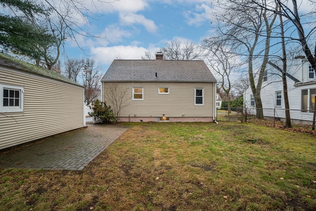 107 Mayflower Road Springfield, MA 01118 - Photo 6 of 32 a view of a house with a yard