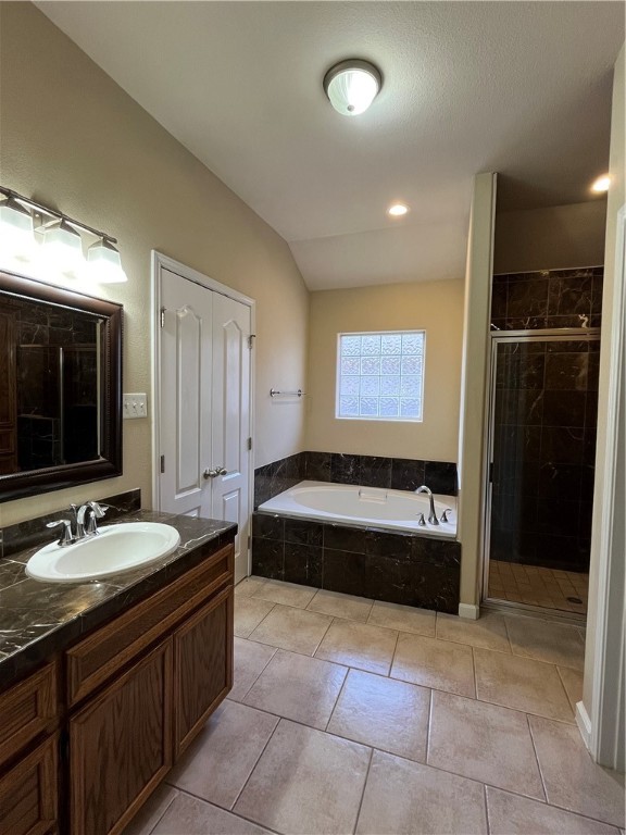 4621 Valor Drive Corpus Christi, TX 78413 - Photo 9 of 13 a spacious bathroom with a tub sink and mirror