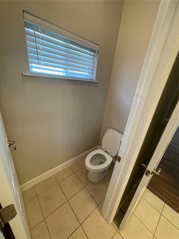 1604 Southwest 66th Drive Gainesville, FL 32607 - Photo 13 of 18 a bathroom with a sink and a toilet