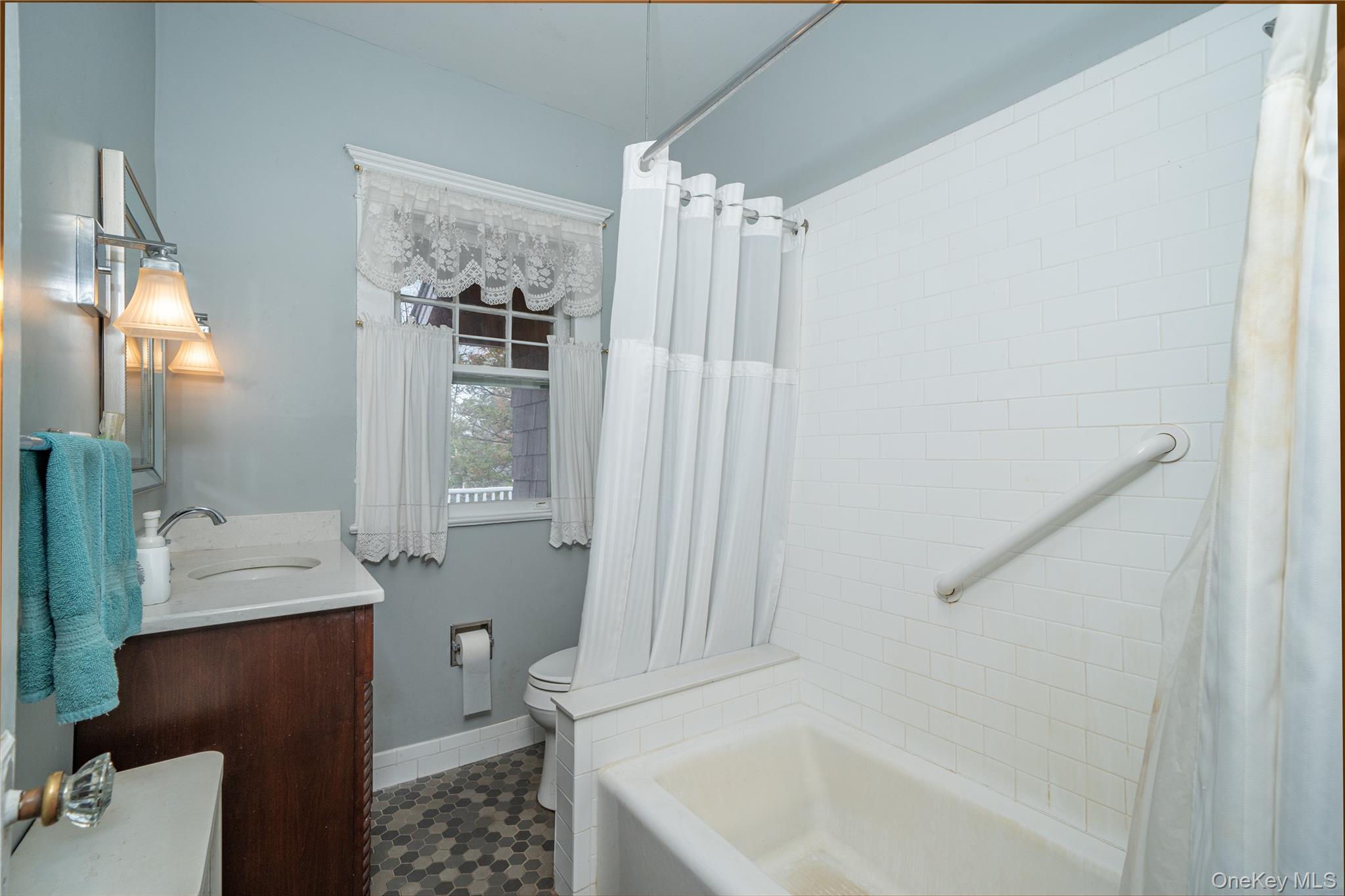 1259 Post Road Scarsdale, NY 10583 - Photo 12 of 20 a bathroom with a sink a toilet and shower