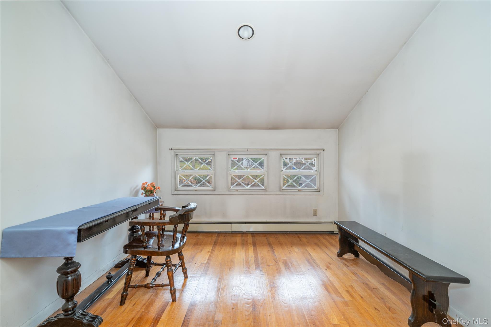 1259 Post Road Scarsdale, NY 10583 - Photo 14 of 20 a view of room with lounge chair and wooden floor