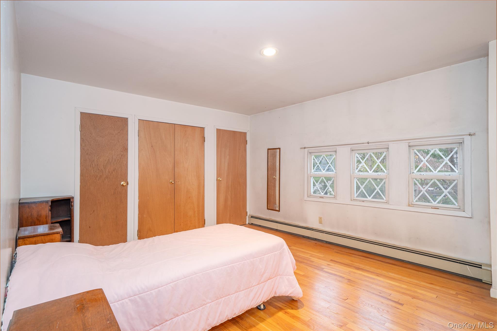 1259 Post Road Scarsdale, NY 10583 - Photo 19 of 20 a bedroom with a bed and a window