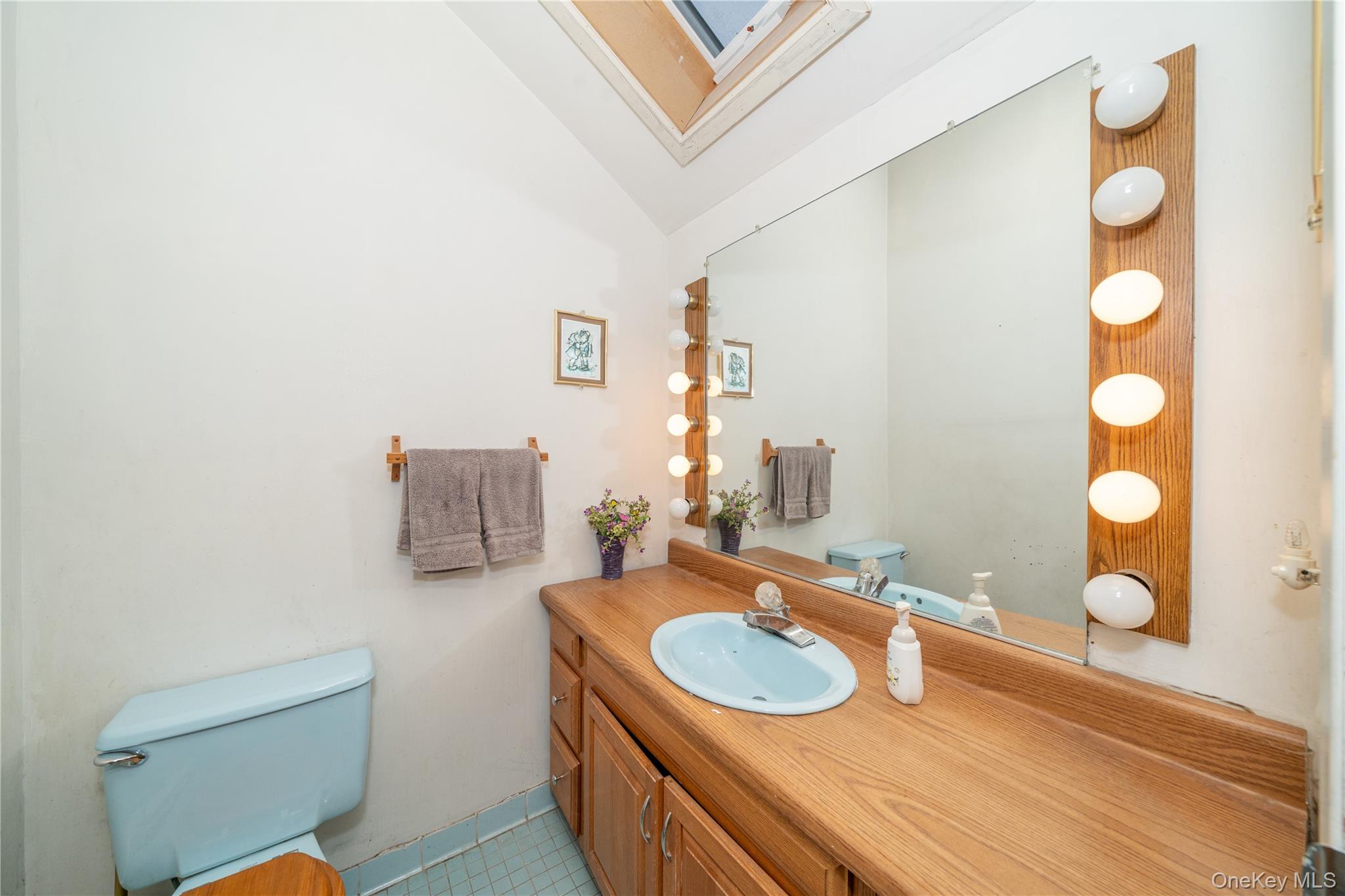 1259 Post Road Scarsdale, NY 10583 - Photo 20 of 20 a bathroom with a sink and a mirror