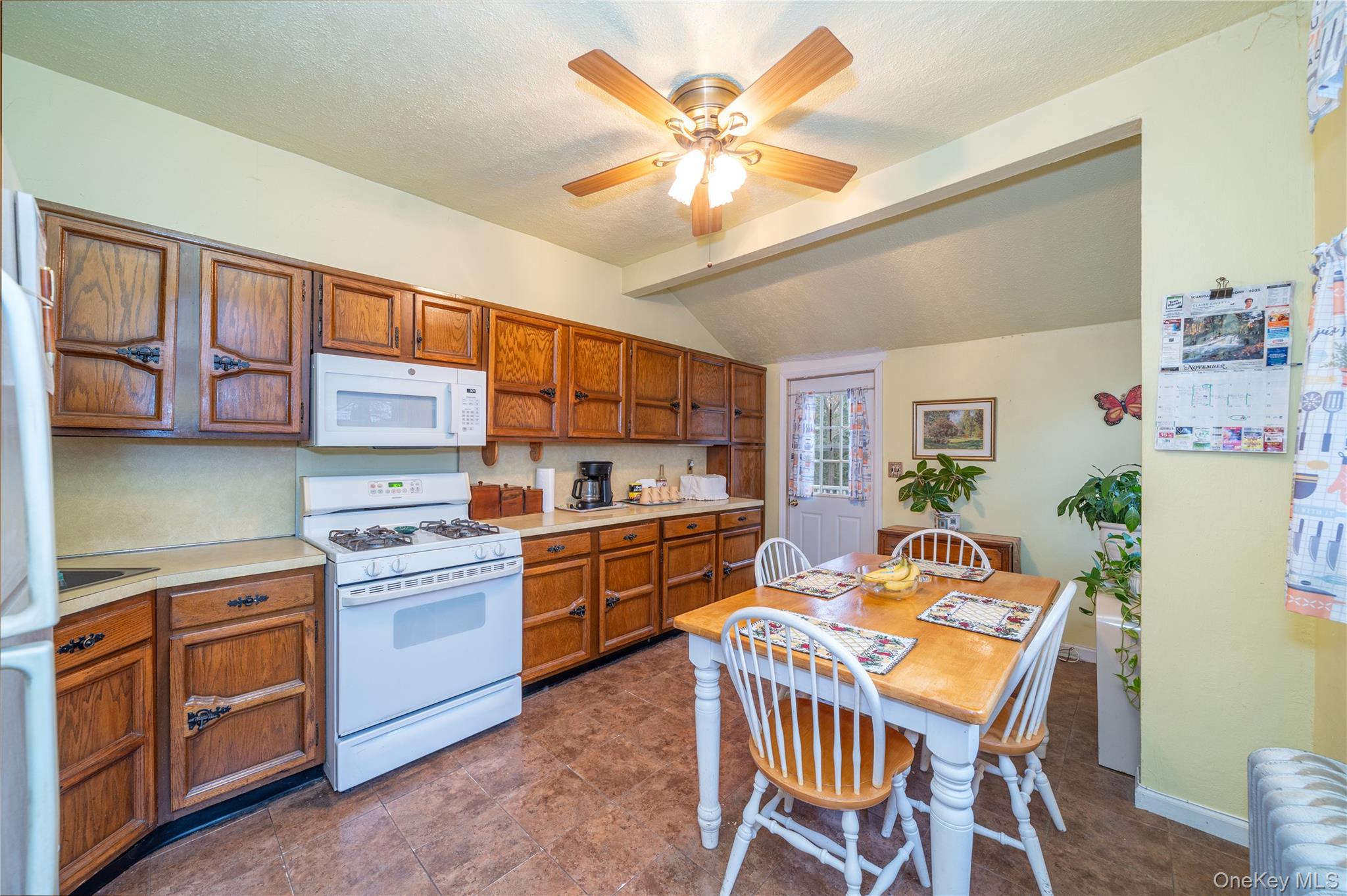 1259 Post Road Scarsdale, NY 10583 - Photo 7 of 20 a kitchen that has a table and chairs in it