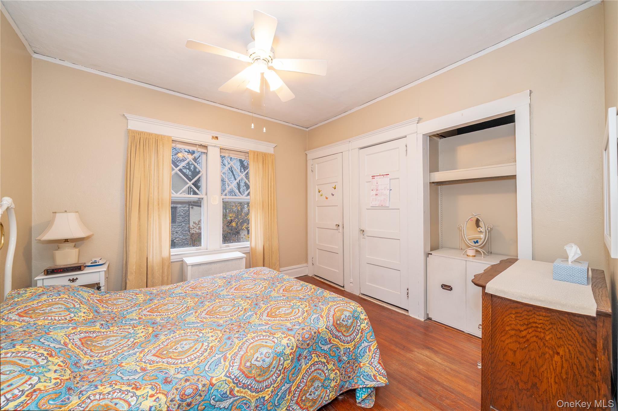 1259 Post Road Scarsdale, NY 10583 - Photo 10 of 20 a bedroom with a bed and a dresser