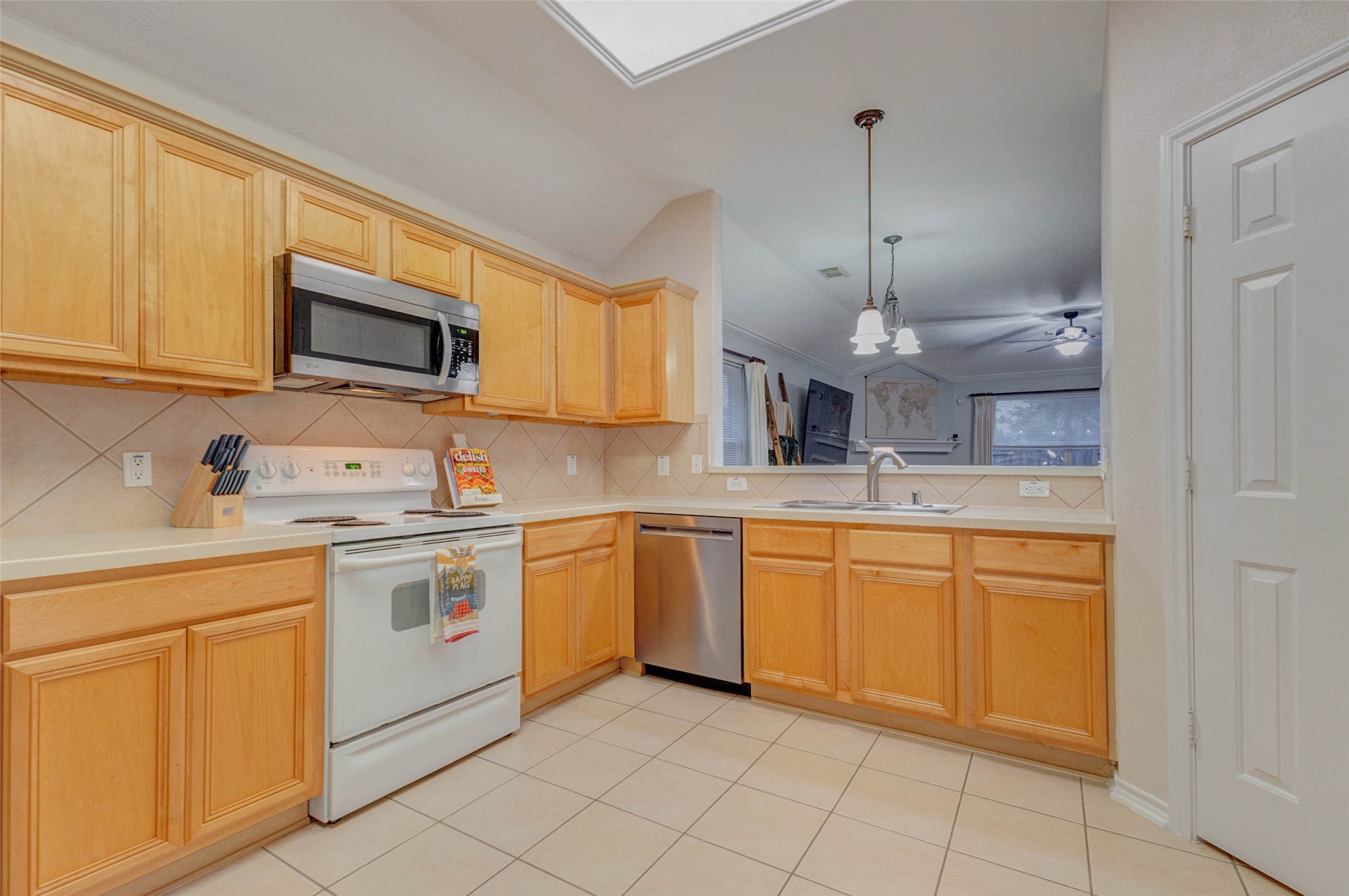2326 Fern Lacy Drive Spring, TX 77388 - Photo 14 of 31 Spacious kitchen featuring ample storage, wraparound counters, and open sightlines to the living room.
