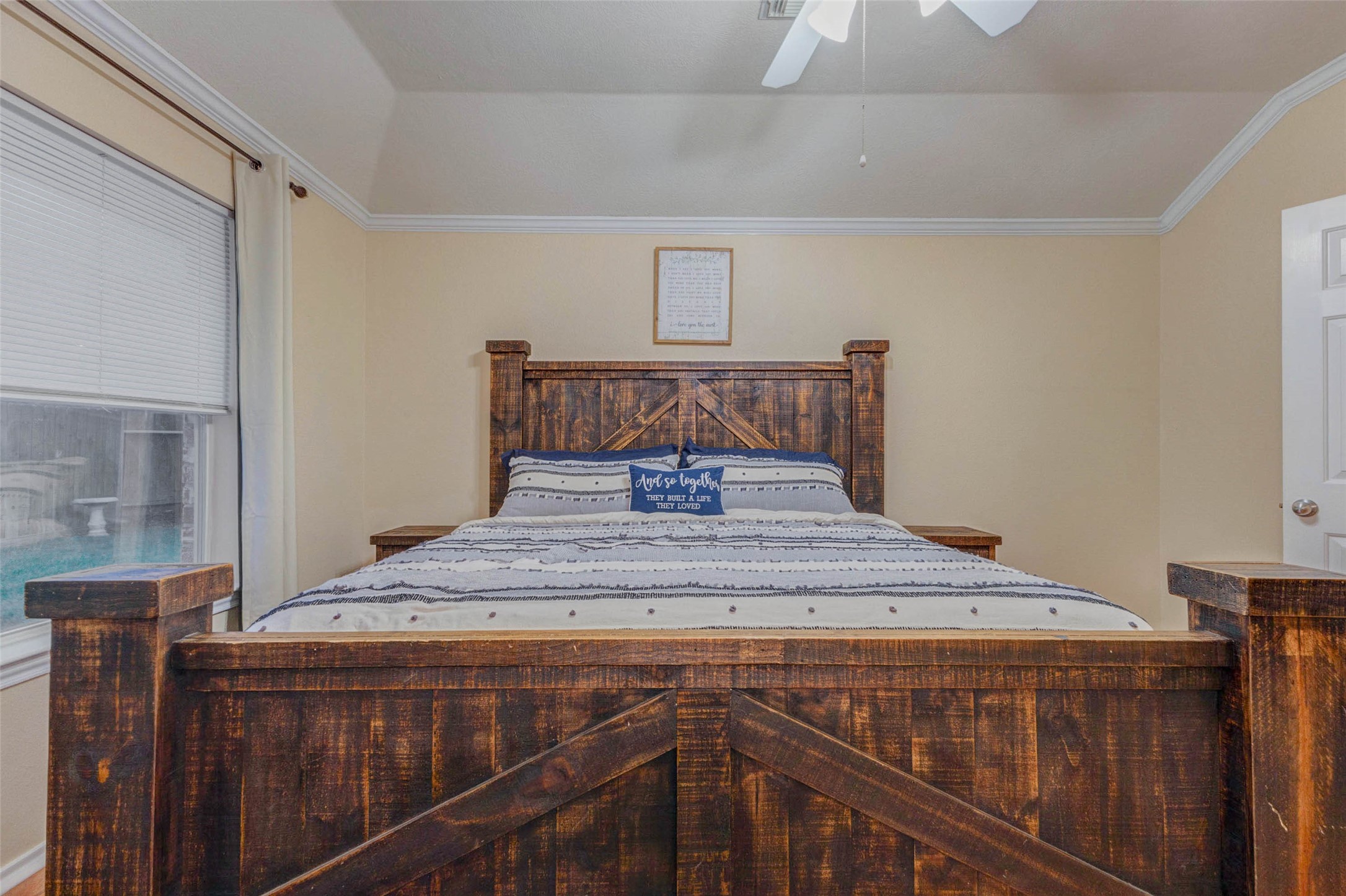 2326 Fern Lacy Drive Spring, TX 77388 - Photo 16 of 31 Expansive primary bedroom with warm flooring, ceiling fan, and relaxing atmosphere.