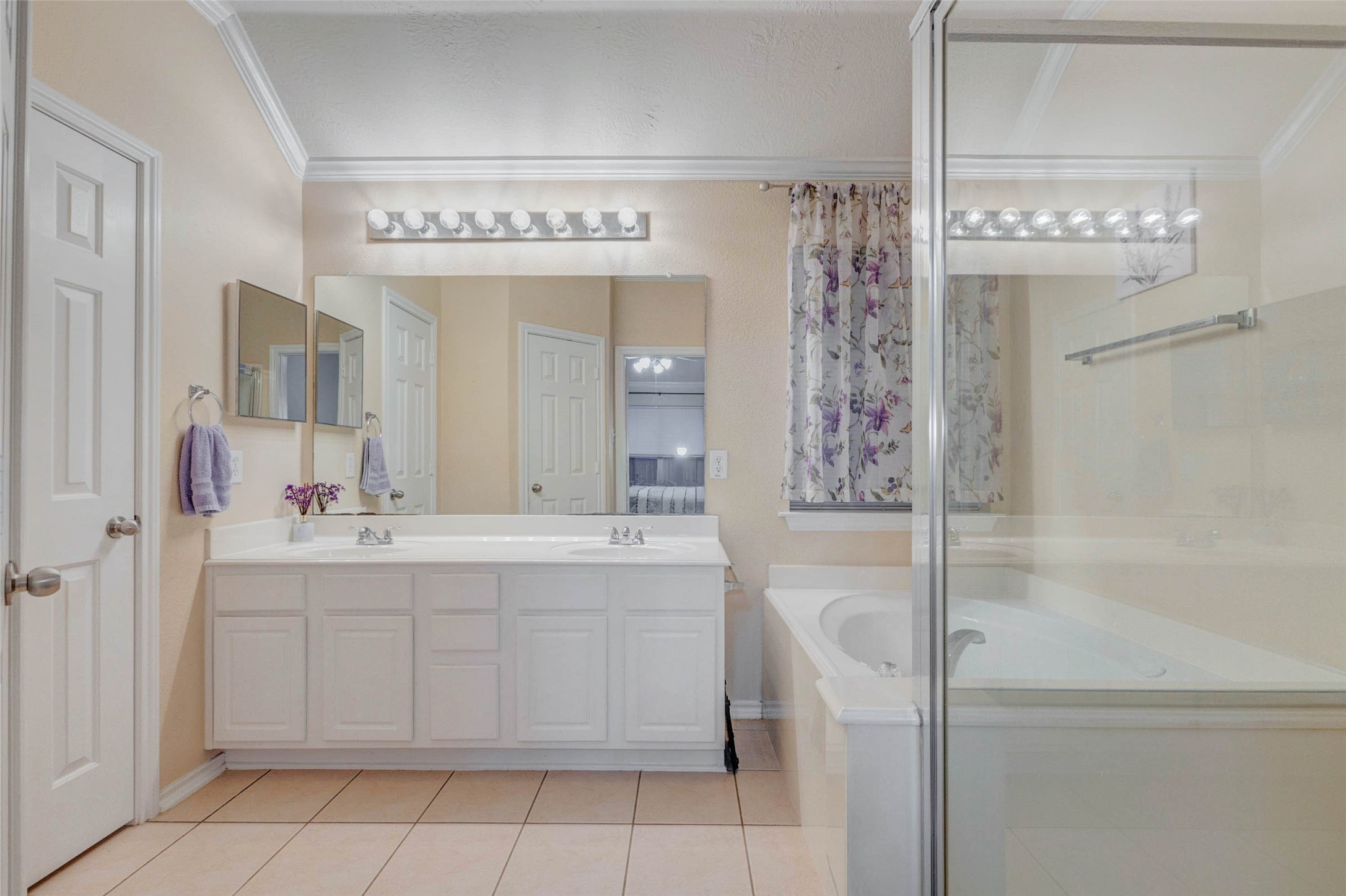 2326 Fern Lacy Drive Spring, TX 77388 - Photo 18 of 31 Primary bathroom with dual-sink vanity, soaking tub, separate shower, and ample storage.