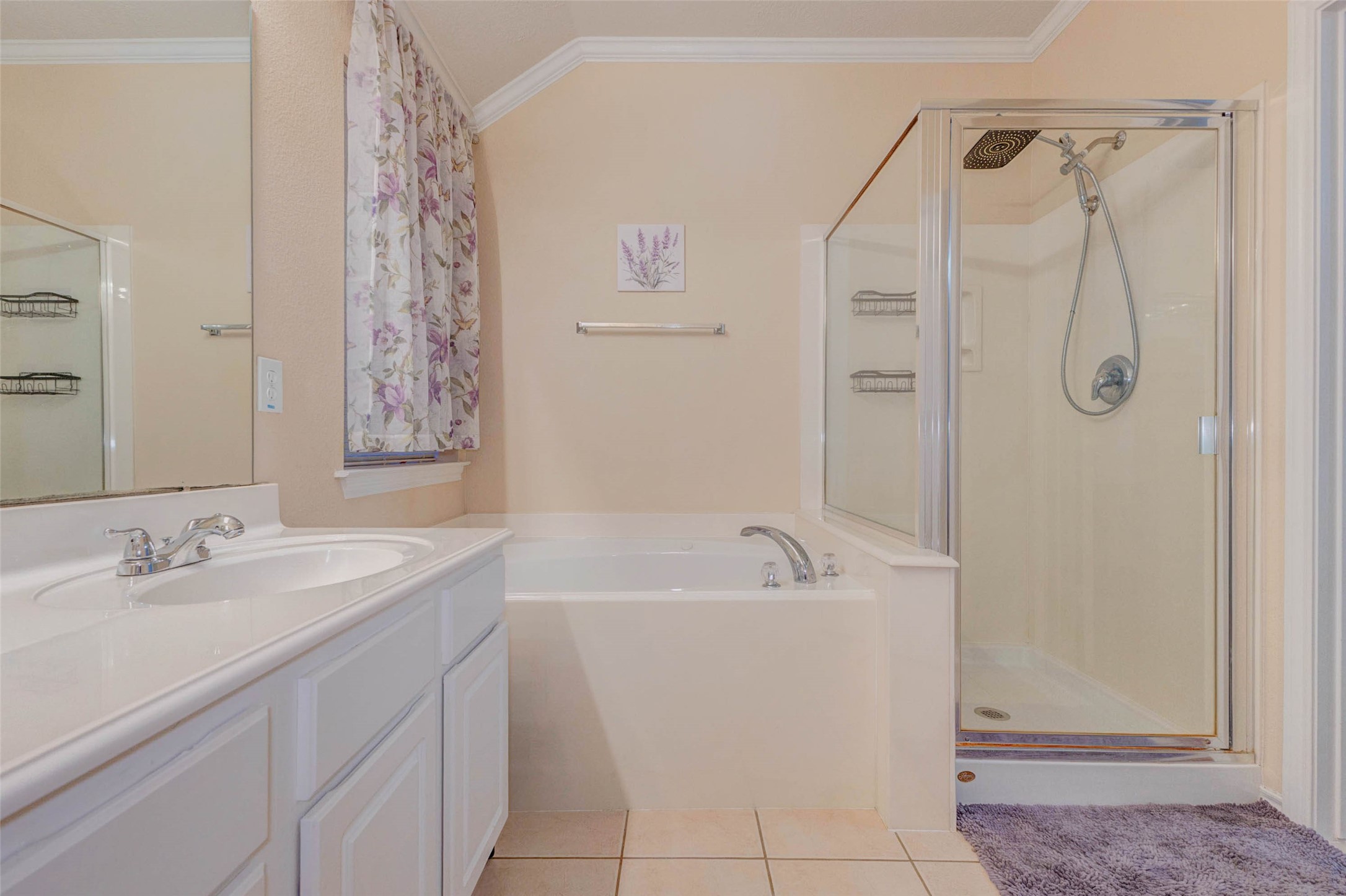 2326 Fern Lacy Drive Spring, TX 77388 - Photo 20 of 31 Spa-like primary bath with soaking tub, glass-enclosed shower, and elegant finishes.