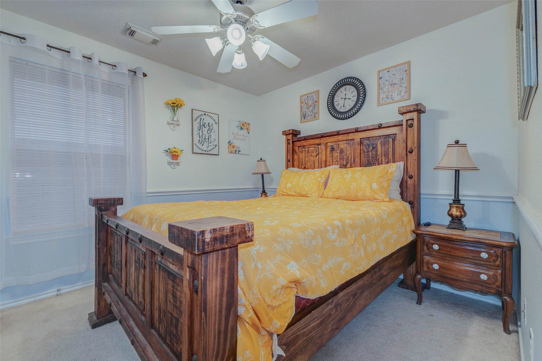 2326 Fern Lacy Drive Spring, TX 77388 - Photo 22 of 31 Comfortable bedroom with plush carpet, ceiling fan, and soft natural light.