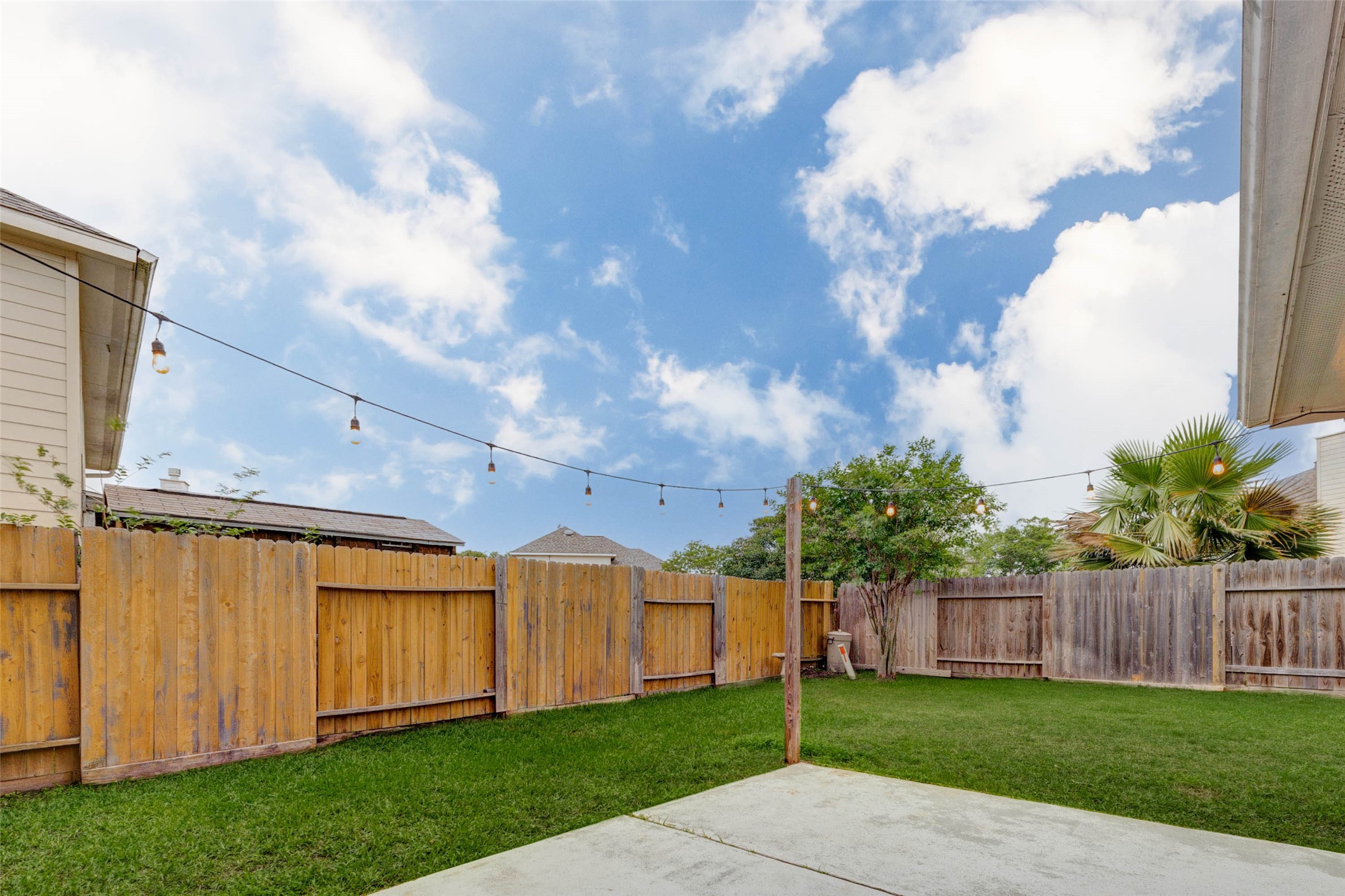 2326 Fern Lacy Drive Spring, TX 77388 - Photo 29 of 31 Private backyard with open green space, patio area, and room to relax or entertain.