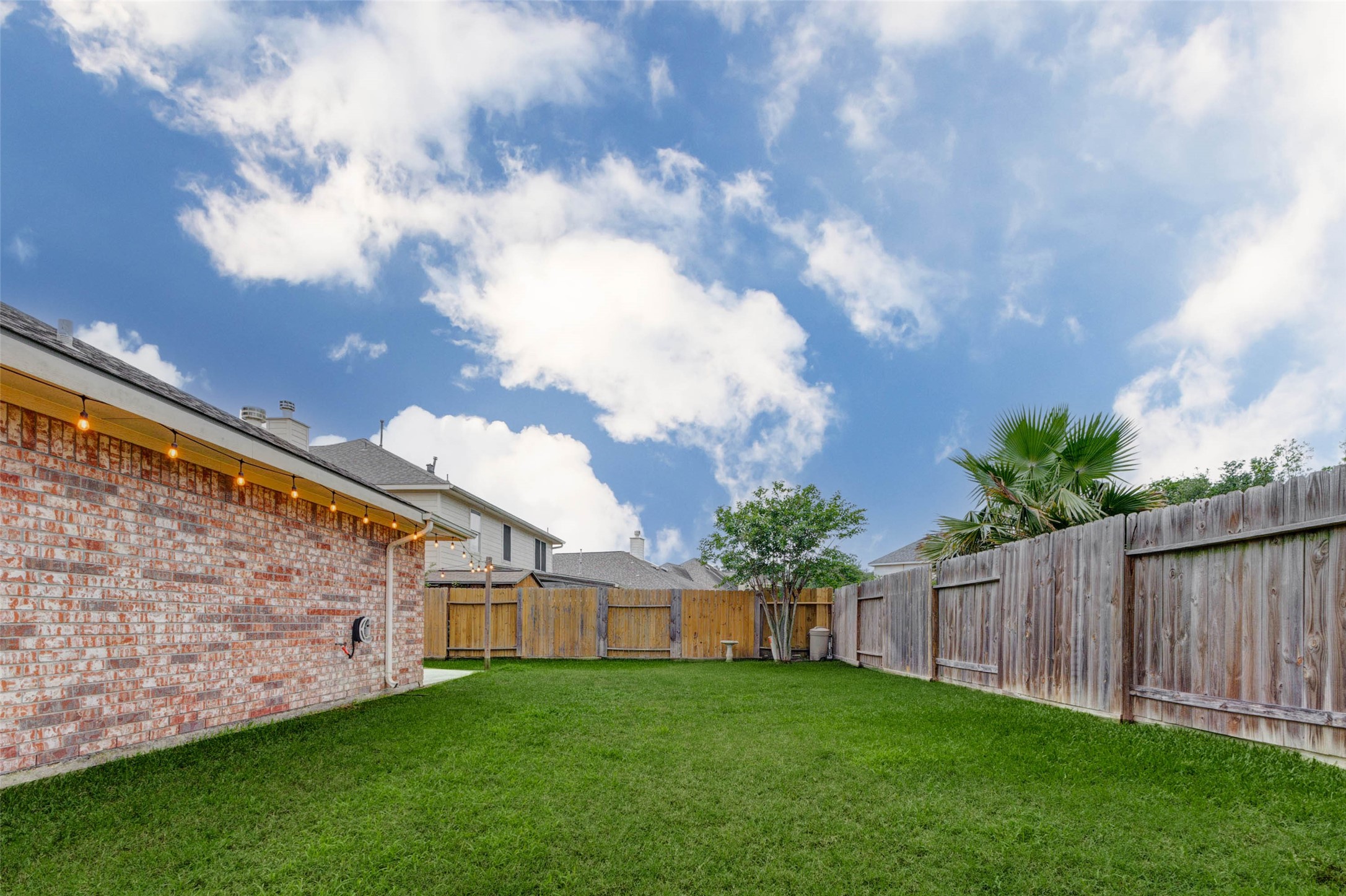 2326 Fern Lacy Drive Spring, TX 77388 - Photo 30 of 31 Private backyard retreat with fenced green space ideal for relaxing or gatherings.