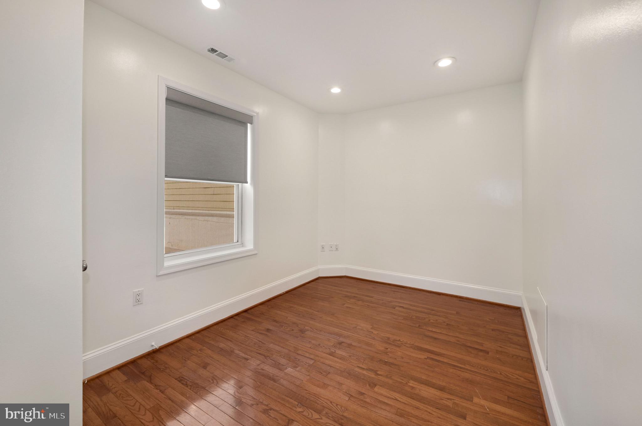729 Kenyon Street Northwest Washington, DC 20010 - Photo 18 of 26 Bright and airy bedroom 1.(Unit A)