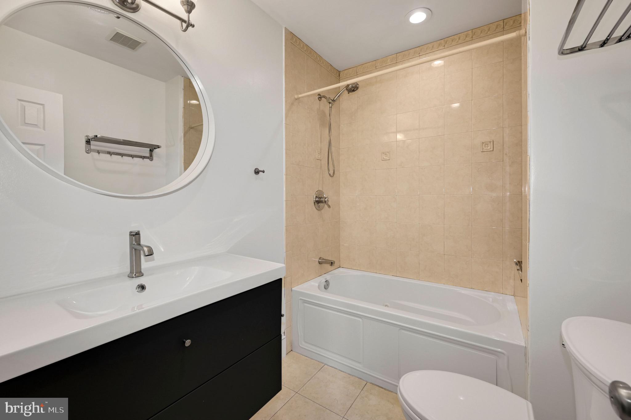 729 Kenyon Street Northwest Washington, DC 20010 - Photo 20 of 26 Modern bathroom with elegant finishes.(Unit A)