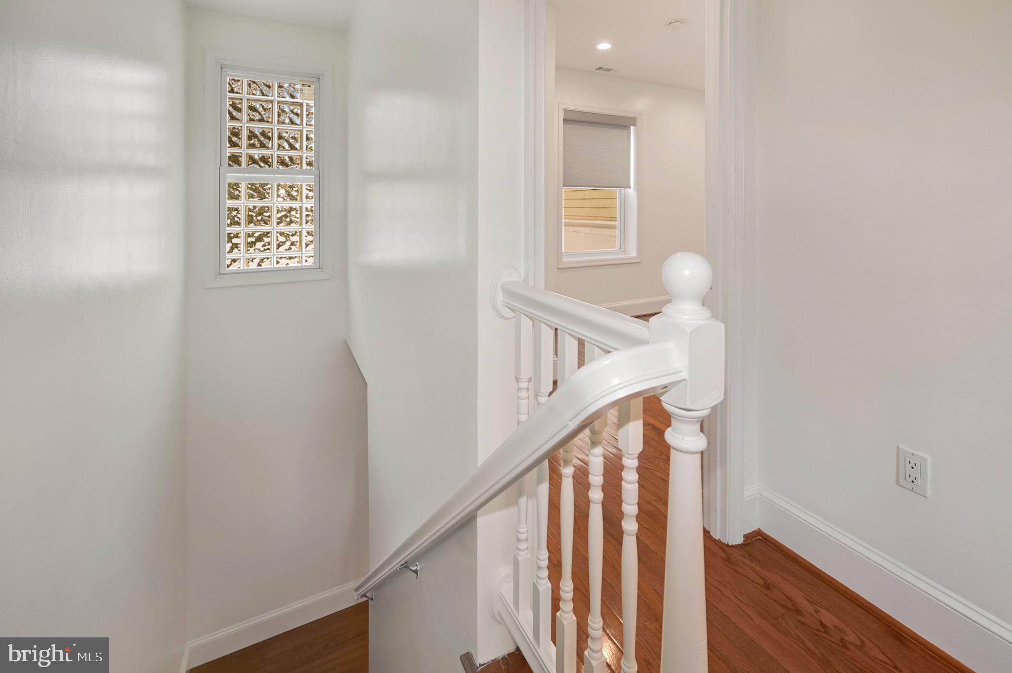729 Kenyon Street Northwest Washington, DC 20010 - Photo 24 of 26 Bright and airy staircase w/modern charm. (Unit A)