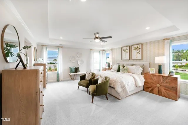 a bedroom with bed and a window