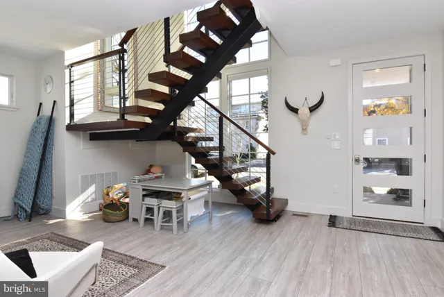 a bedroom with a bed and a lamp on table