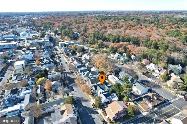 an aerial view of a city with lots of residential buildings