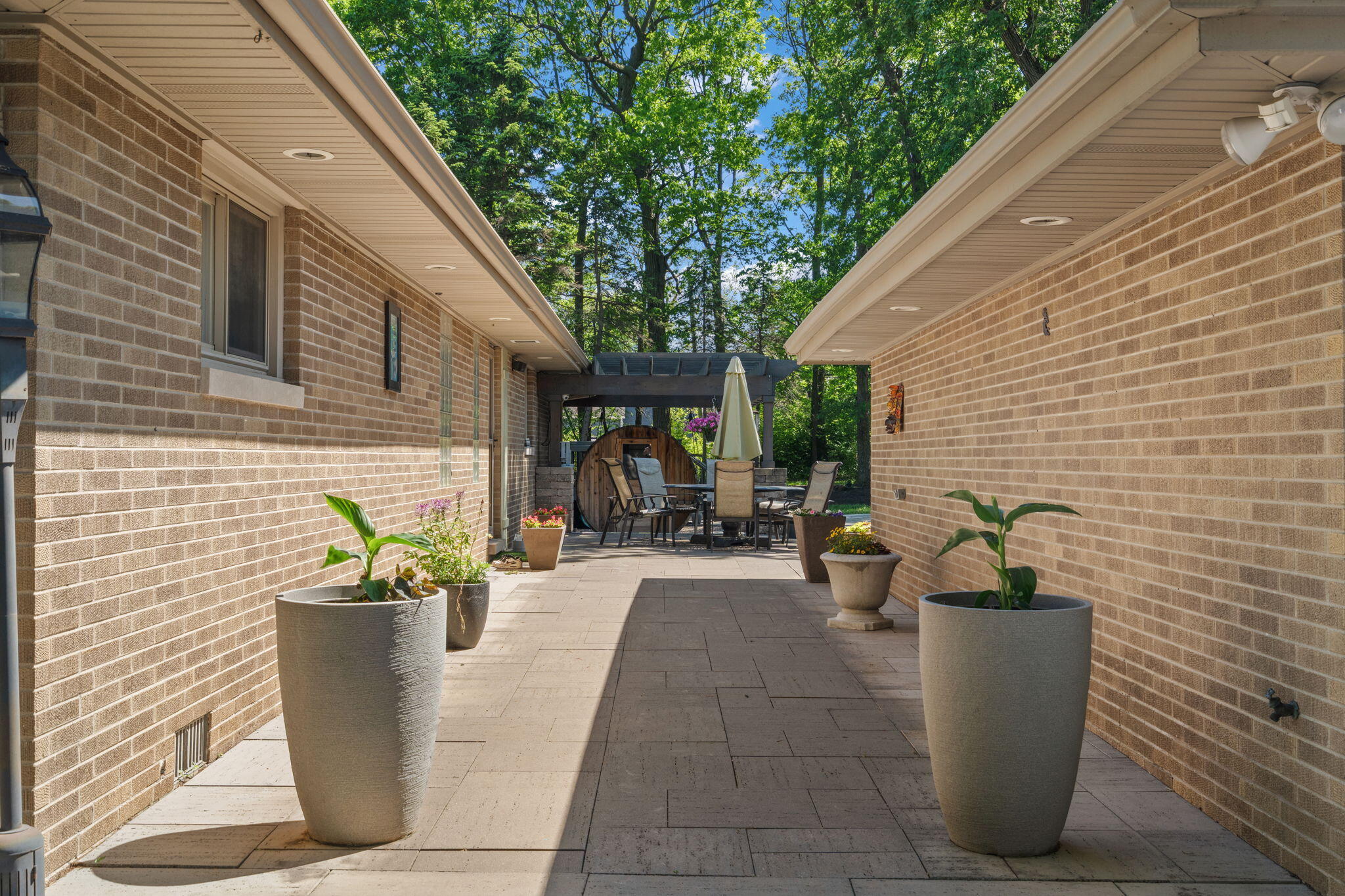 11728 Monroe Place Crown Point, IN 46307 - Photo 41 of 44 a view of a patio with plants and potted plants