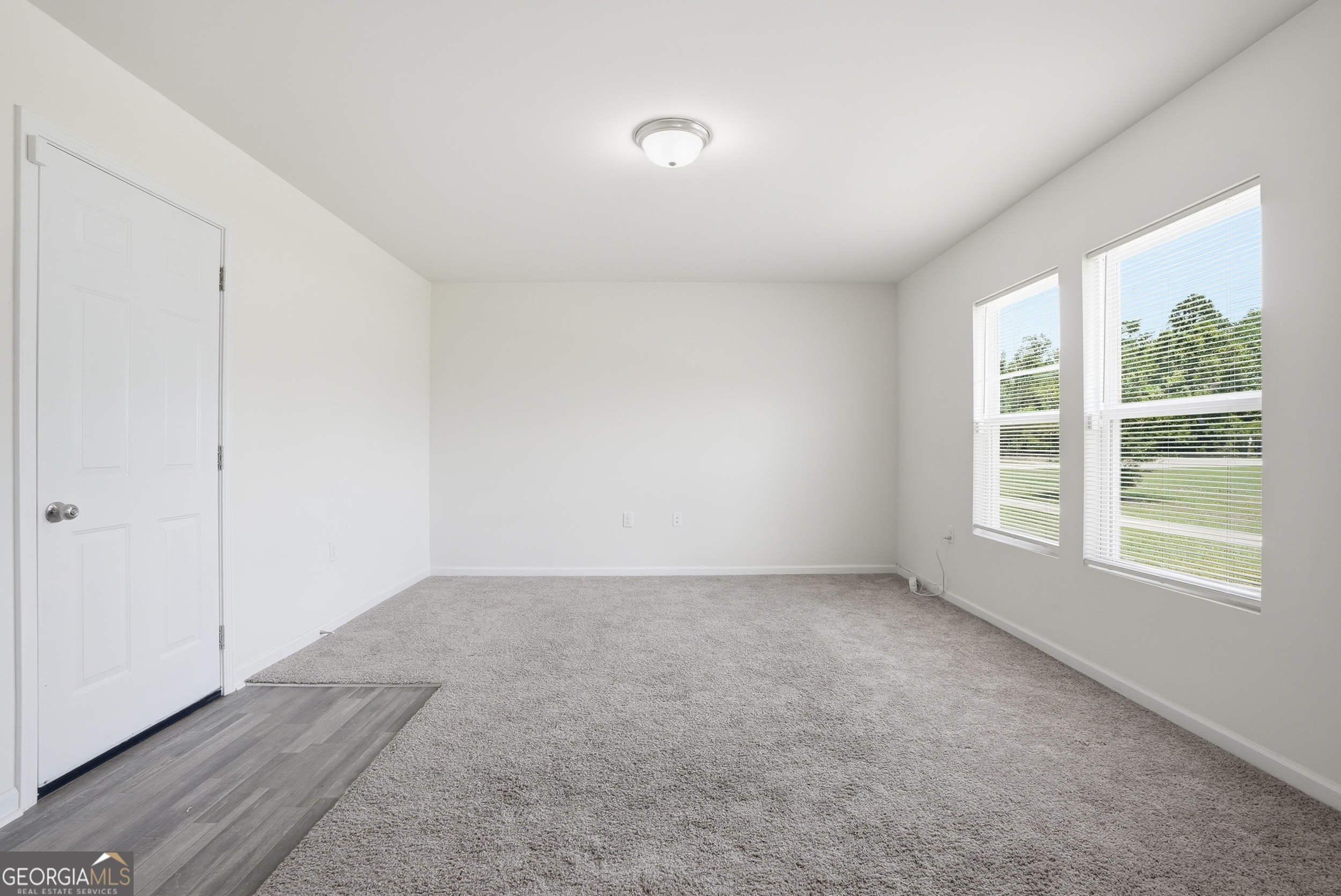 225 Rendell Lane Hinesville, GA 31313 - Photo 15 of 33 an empty room with a window