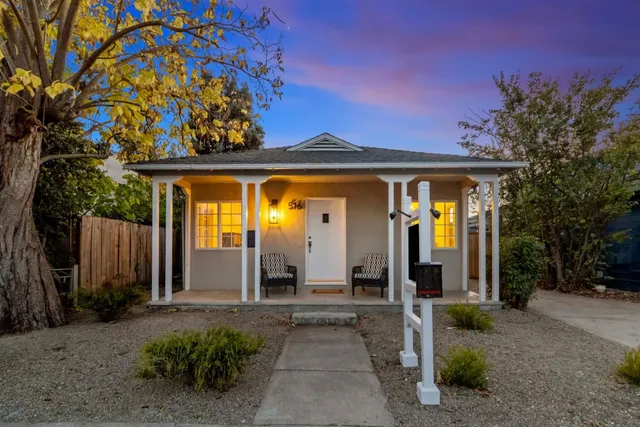 a front view of a house with a porch