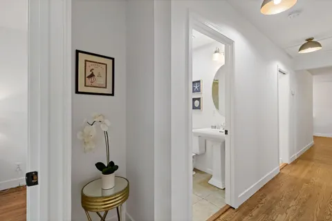 a bathroom with a sink and mirror
