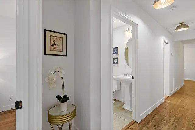 a bathroom with a sink and mirror