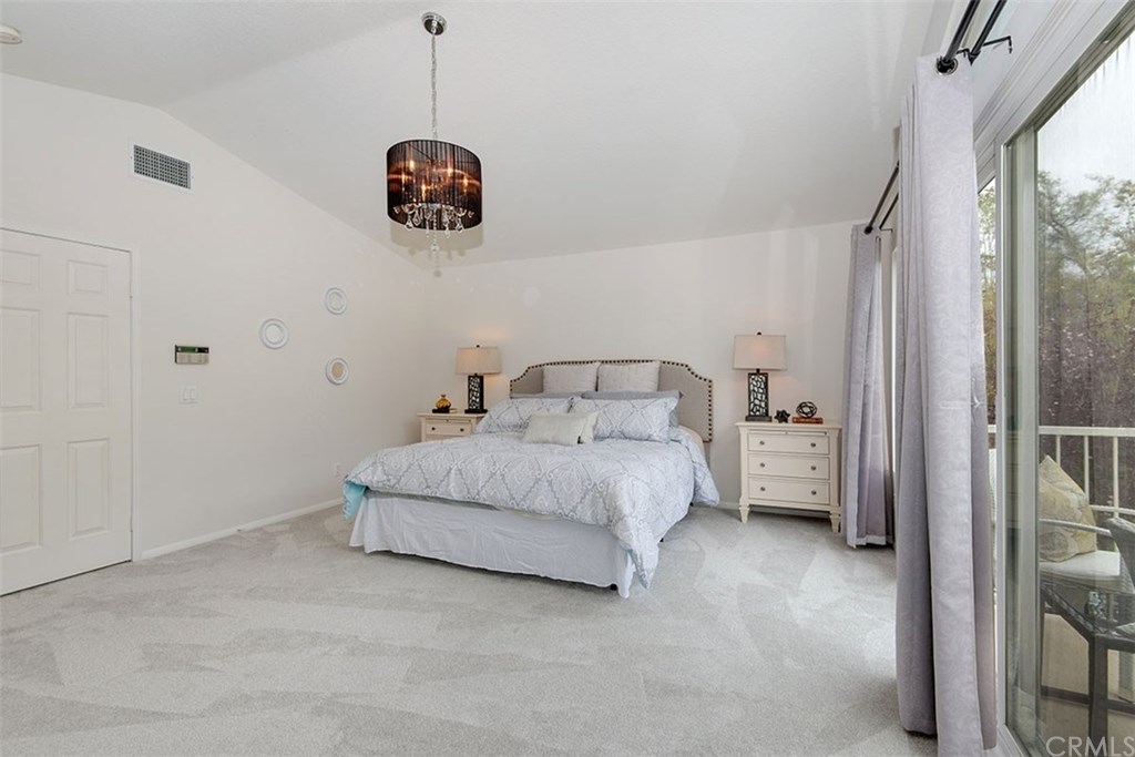 27952 Rural Lane Laguna Niguel, CA 92677 - Photo 13 of 28 a bedroom with a bed and a window