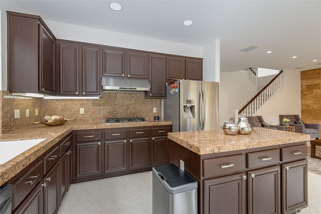 27952 Rural Lane Laguna Niguel, CA 92677 - Photo 8 of 28 a kitchen with a sink stove and refrigerator