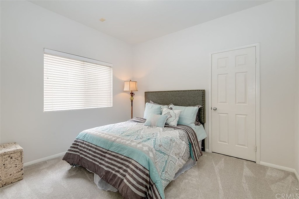 27952 Rural Lane Laguna Niguel, CA 92677 - Photo 9 of 28 a bedroom with a bed and a window
