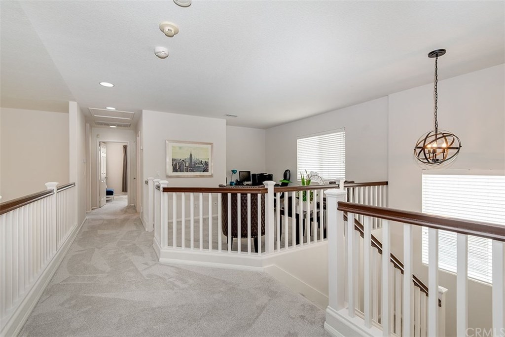27952 Rural Lane Laguna Niguel, CA 92677 - Photo 10 of 28 a view of a hallway with windows