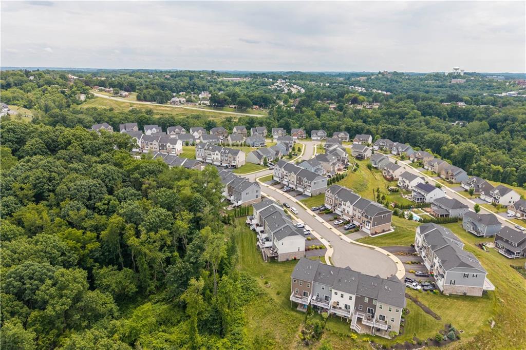 152-160 Cole Drive McKees Rocks, PA 15136 - Photo 38 of 39 an aerial view of a city with lots of residential buildings and mountain view in back