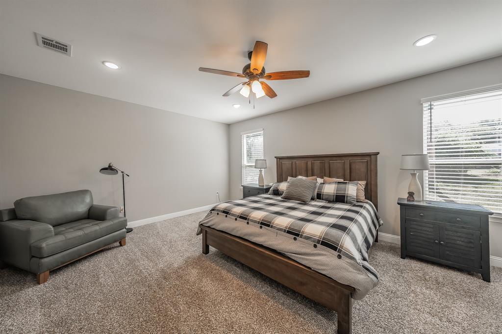 117 Rock Salt Drive Springtown, TX 76082 - Photo 17 of 38 Bedroom featuring neutral-toned walls, plush carpet flooring, recessed lighting, and a ceiling fan with integrated lighting