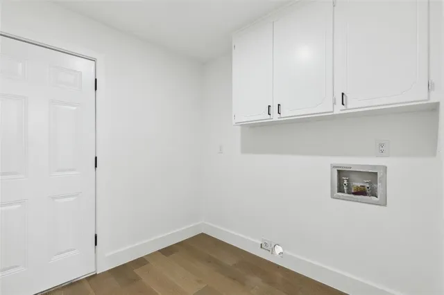 an empty room with cabinet