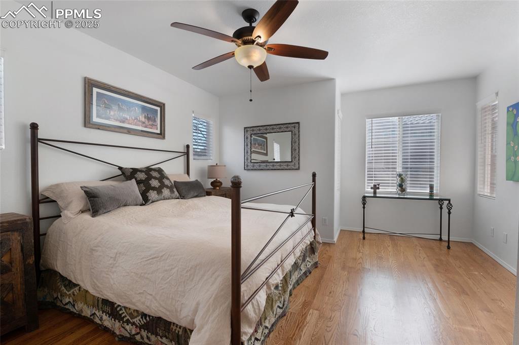 3294 Apogee View Colorado Springs, CO 80906 - Photo 15 of 35 a bedroom with bed and a window