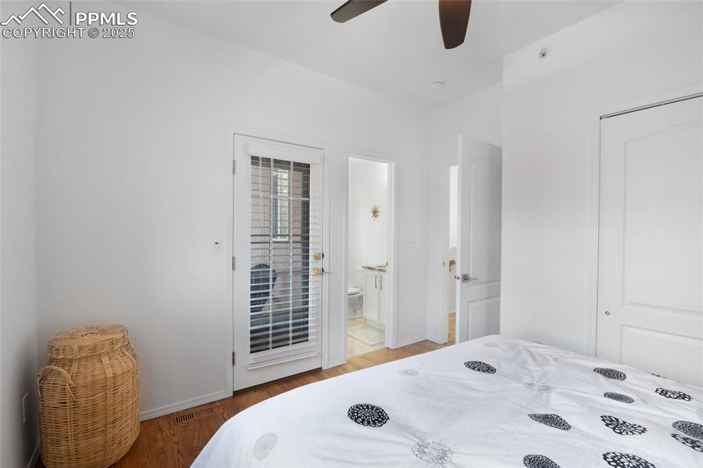 3294 Apogee View Colorado Springs, CO 80906 - Photo 19 of 35 a bedroom with a bed and walk in closet