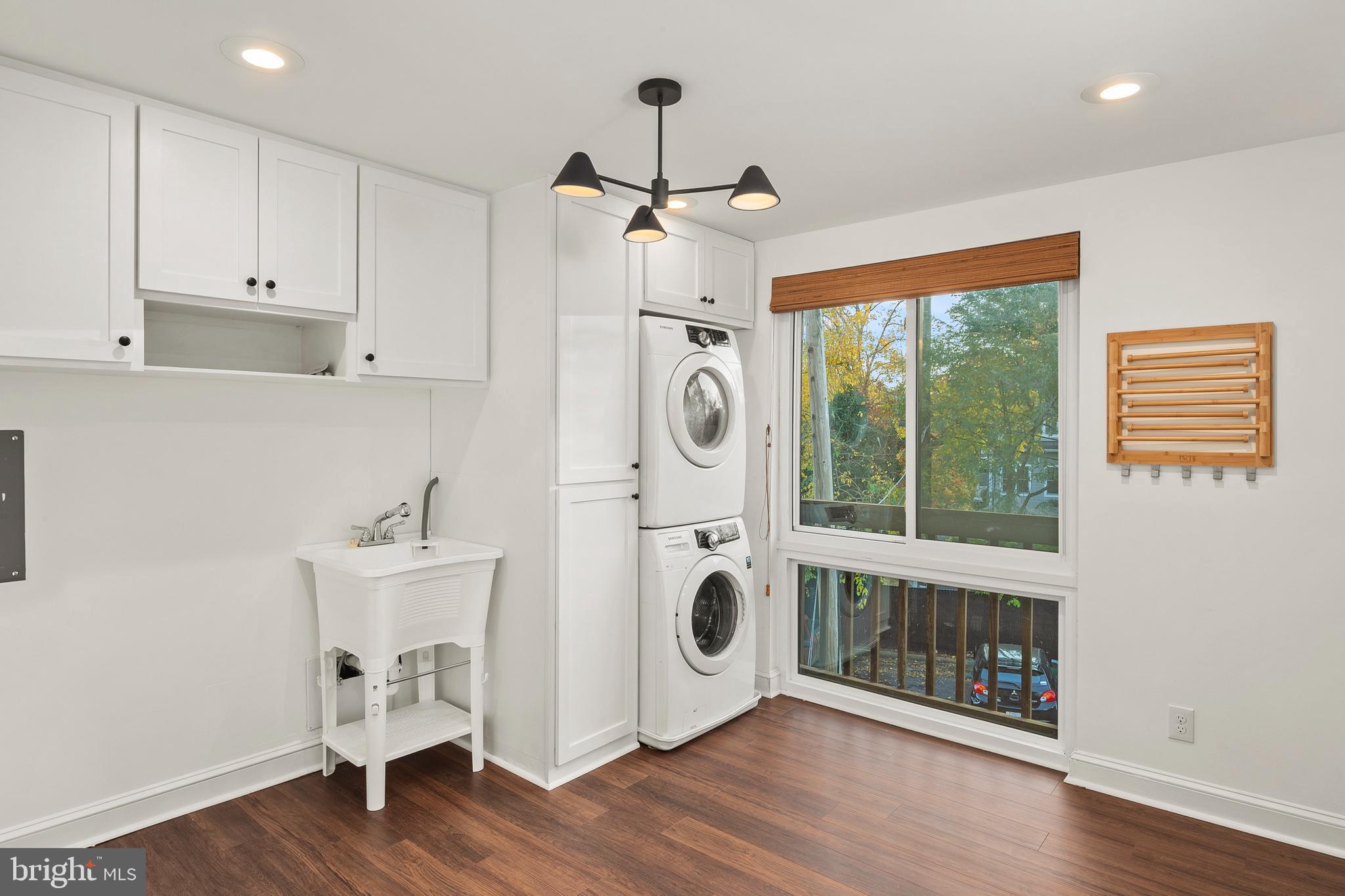 755 Fairview Avenue, Unit 755D Annapolis, MD 21403 - Photo 15 of 44 a view of a kitchen with wooden floor and electronic appliances