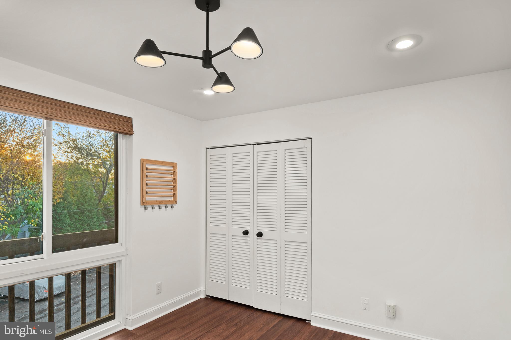 755 Fairview Avenue, Unit 755D Annapolis, MD 21403 - Photo 16 of 44 a view of empty room with wooden floor and fan