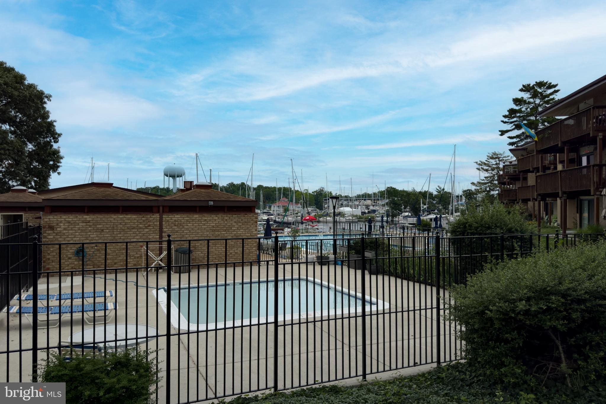 755 Fairview Avenue, Unit 755D Annapolis, MD 21403 - Photo 36 of 44 a view of a roof deck with wooden fence and plants