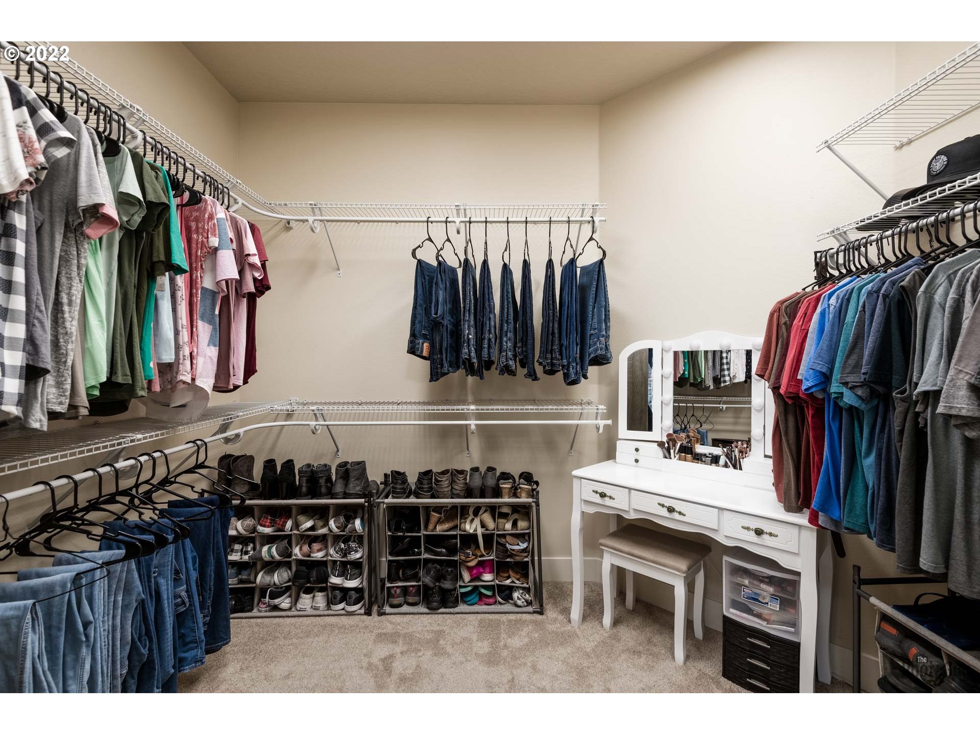853 67th Place Springfield, OR 97478 - Photo 21 of 32 a view of walk in closet with clothes and shoes
