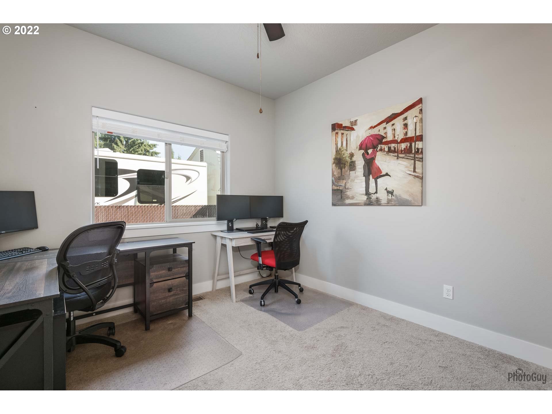 853 67th Place Springfield, OR 97478 - Photo 25 of 32 a view of a workspace with furniture and a window