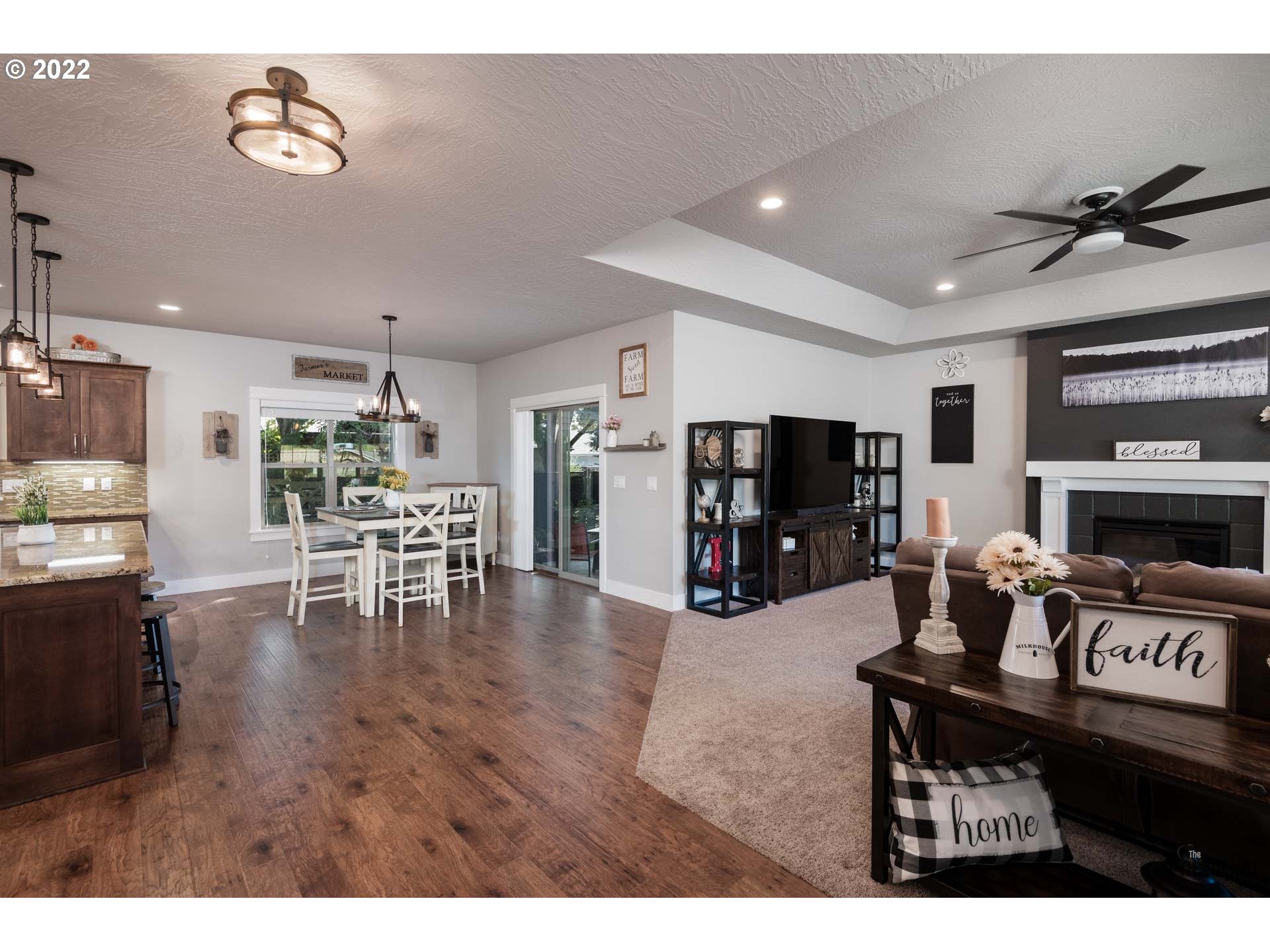853 67th Place Springfield, OR 97478 - Photo 3 of 32 a living room with furniture and a flat screen tv
