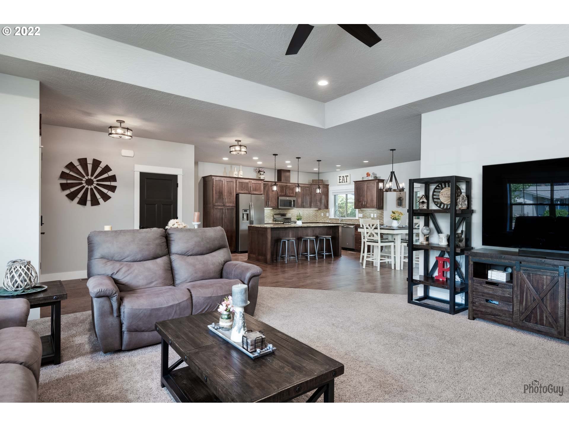 853 67th Place Springfield, OR 97478 - Photo 7 of 32 a living room with lots of furniture and a flat screen tv