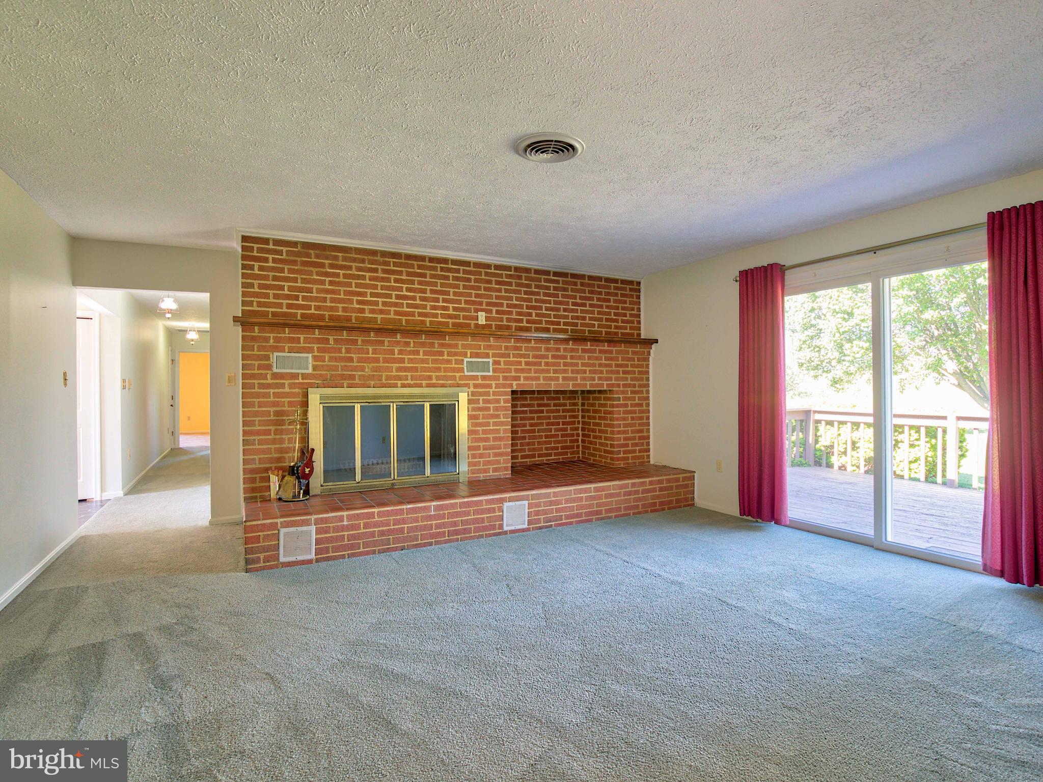 164 Hanging Tree Road Winchester, VA 22603 - Photo 15 of 43 Beautiful brick woodburning fireplace in Family Rm